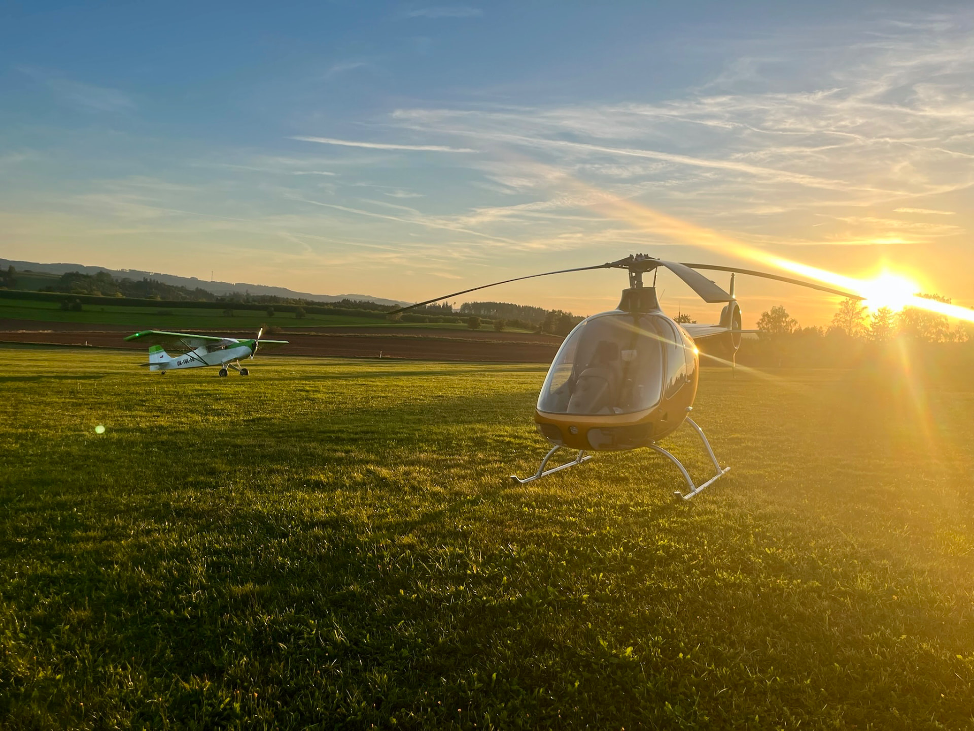 Cabri G2 at sunset on the airfield grass
